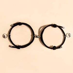 Silver Wave Pendants on Black String Bracelet